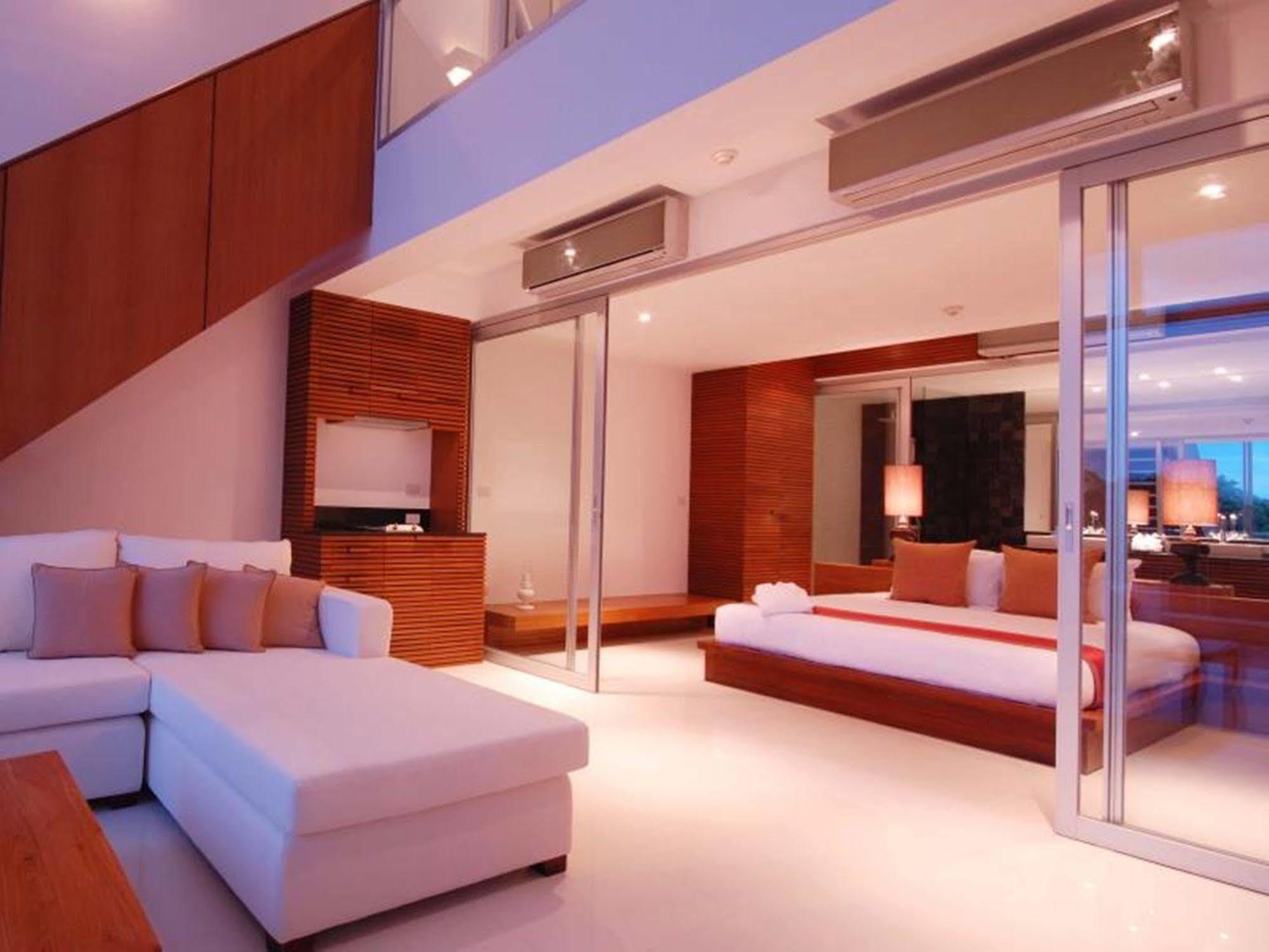 The Quarter Phuket Hotel Pantai Surin Bagian luar foto